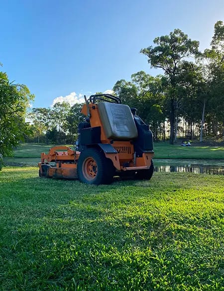 Lawn mowing service in Brookwater using a ride-on mower
