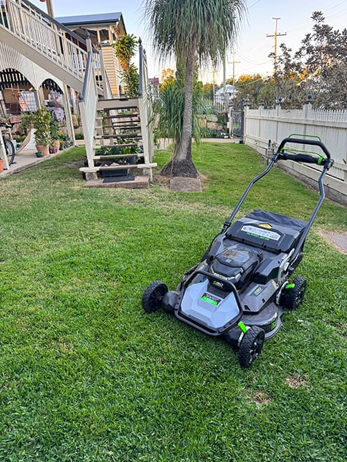 commercial battery lawn mowing job in Eastern Heights mowing residential property